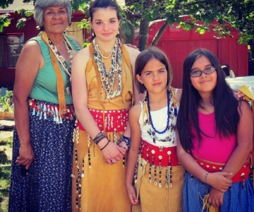 A photo featuring from left to right April Moore (grandmother), Brooklyn Shinabargar (granddaughter), Sadie Hampshir (granddaughter), and Isabella Delatorre (niece).