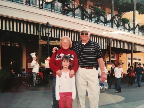 Author Hannah Shows as a child with her grandparents at Disneyland circa 2005