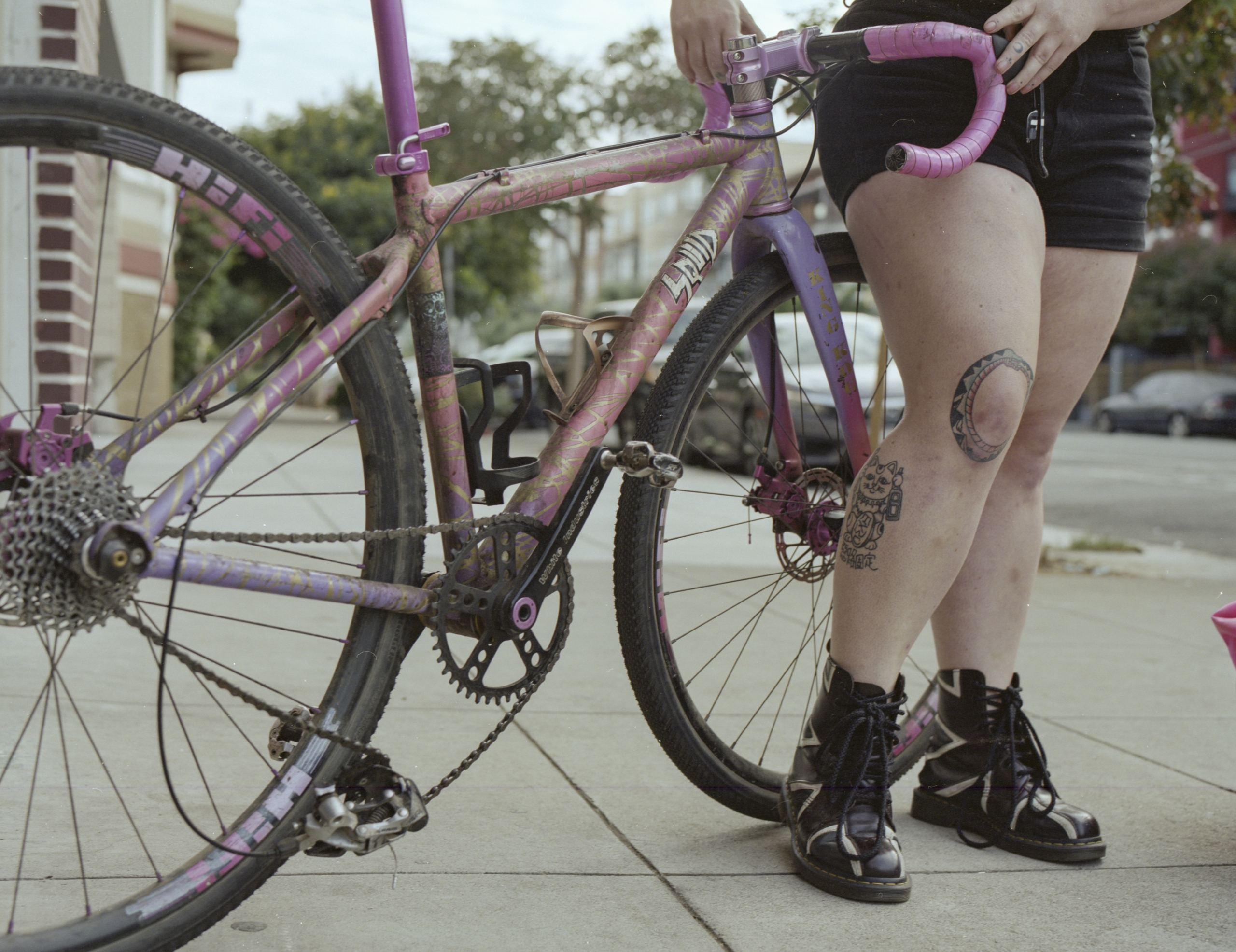 legs of cyclist, Tasha Rose, by pink bike