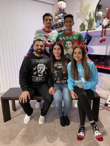 Family photo of Chauhans at home during Christmas time