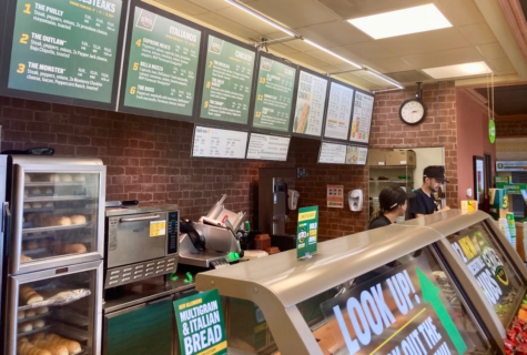 Subway workers make sandwiches
