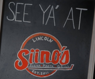 Siino's pizza sign in chalk